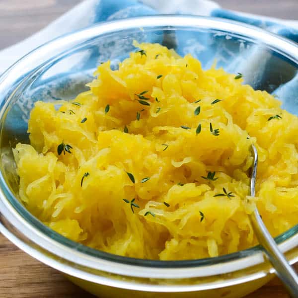 Roasted Spaghetti Squash with thyme leaves.