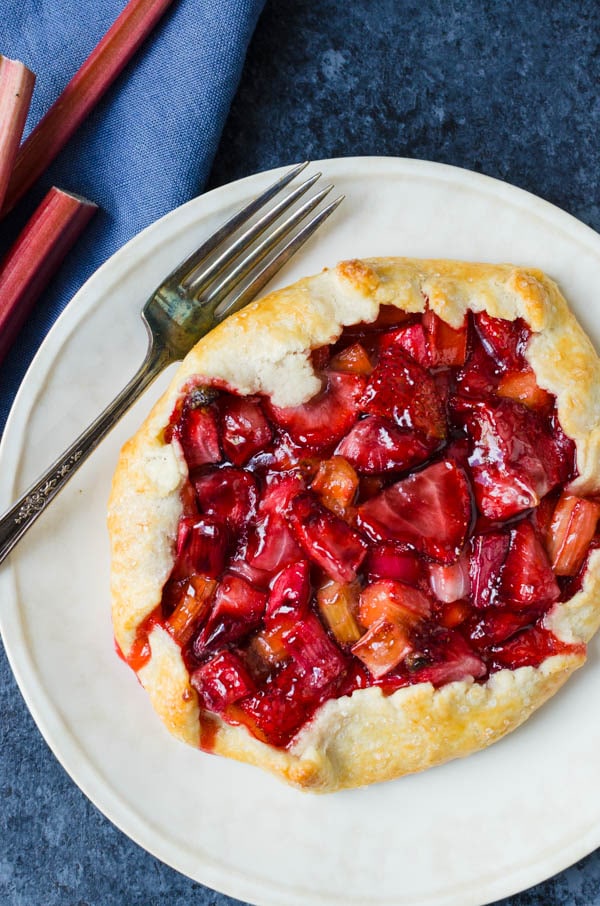  strawberry rhubarb galette with homemade pastry on a plate 
