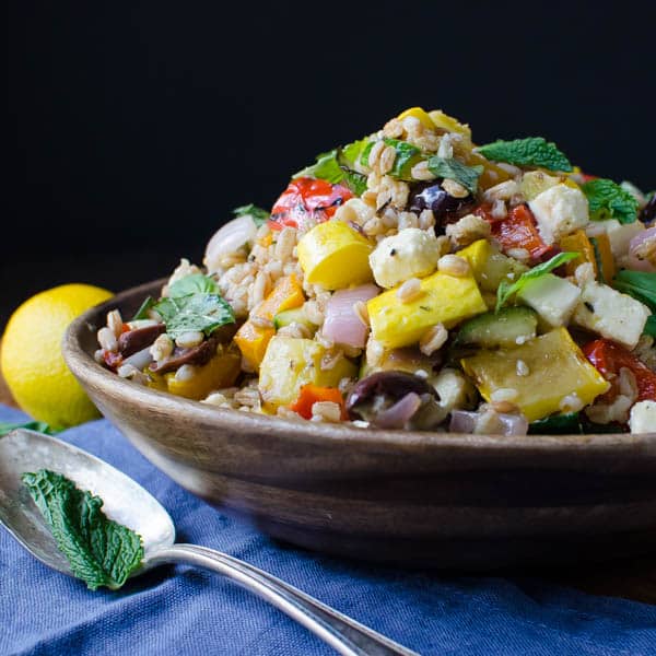 Grilled Vegetables with Feta and Farro with spoon mint and lemon.
