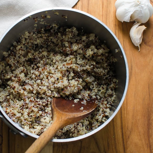 quinoa in pot with spoon