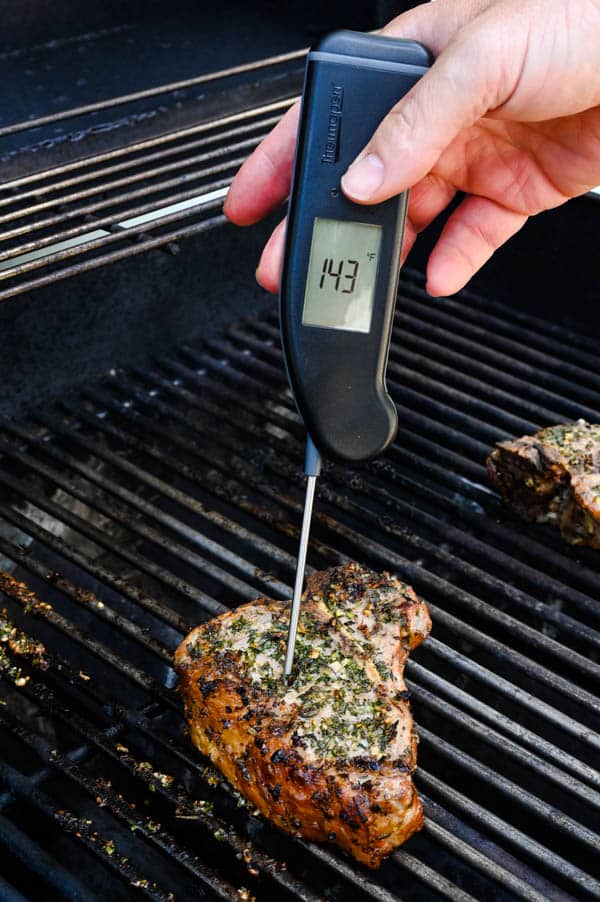 Checking the temperature of the veal with a Thermoworks Thermapen.