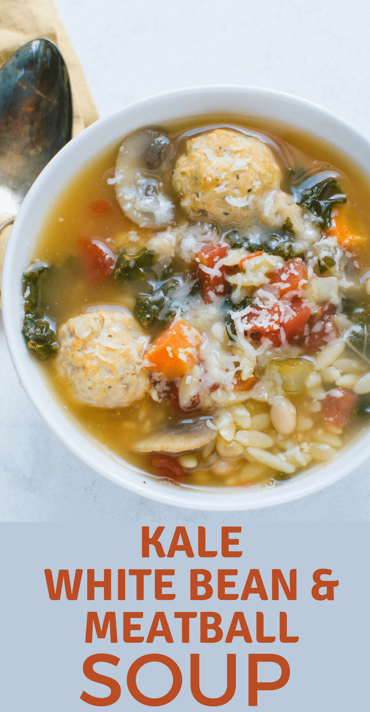 Need a healthy winter soup recipe? Kale, White Bean and Meatball Soup with orzo, mushrooms and tomatoes will fill you up! Healthier with turkey meatballs. #soup #wintersoup #fallsoup #meatball #turkeymeatballs #orzo #whitebeans #beansoup #homemadesoup #kale #healthysoup #mushrooms #chickenbroth #easysouprecipe