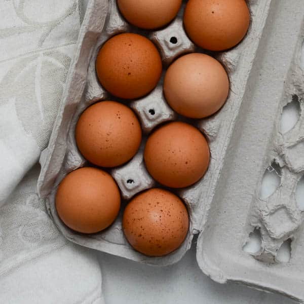 carton of brown eggs