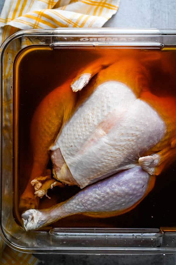 turkey submerged in bourbon maple liquid.