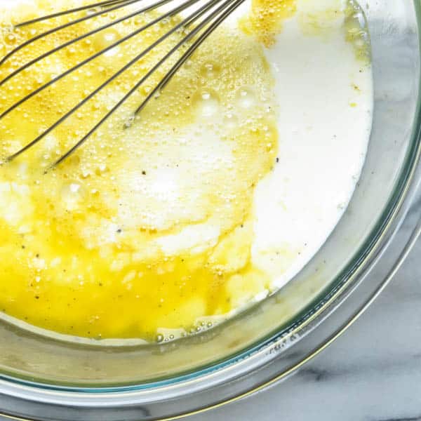 eggs and cream with a whisk
