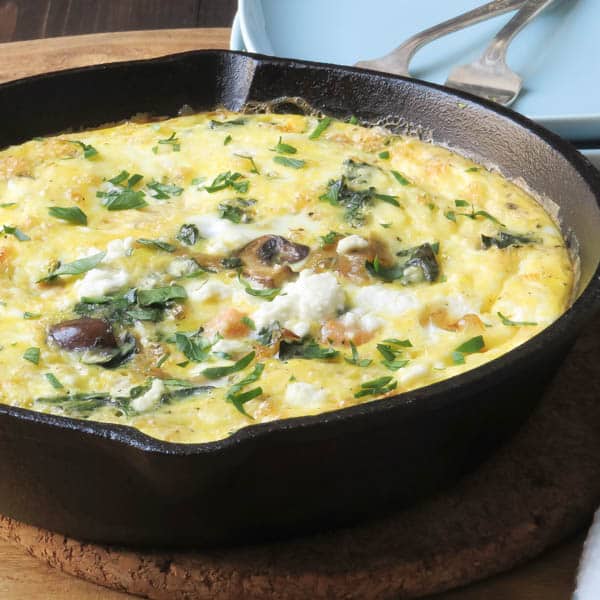Salmon and Caramelized Onion Frittata in cast iron skillet