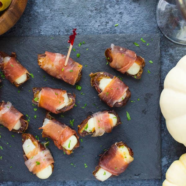 serving manchego cheese recipes on a slate tray.