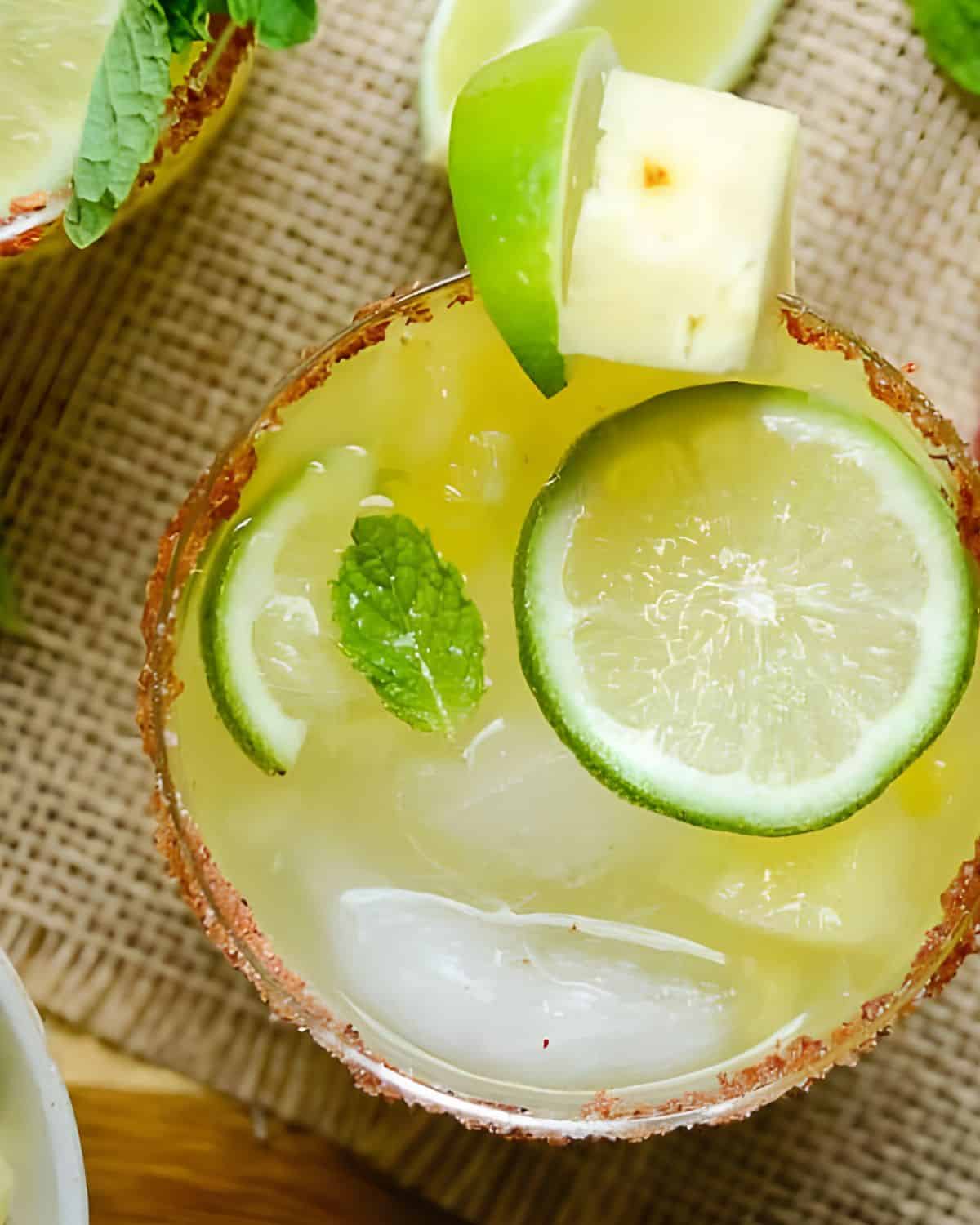 Pineapple Mojito in a glass with garnish.