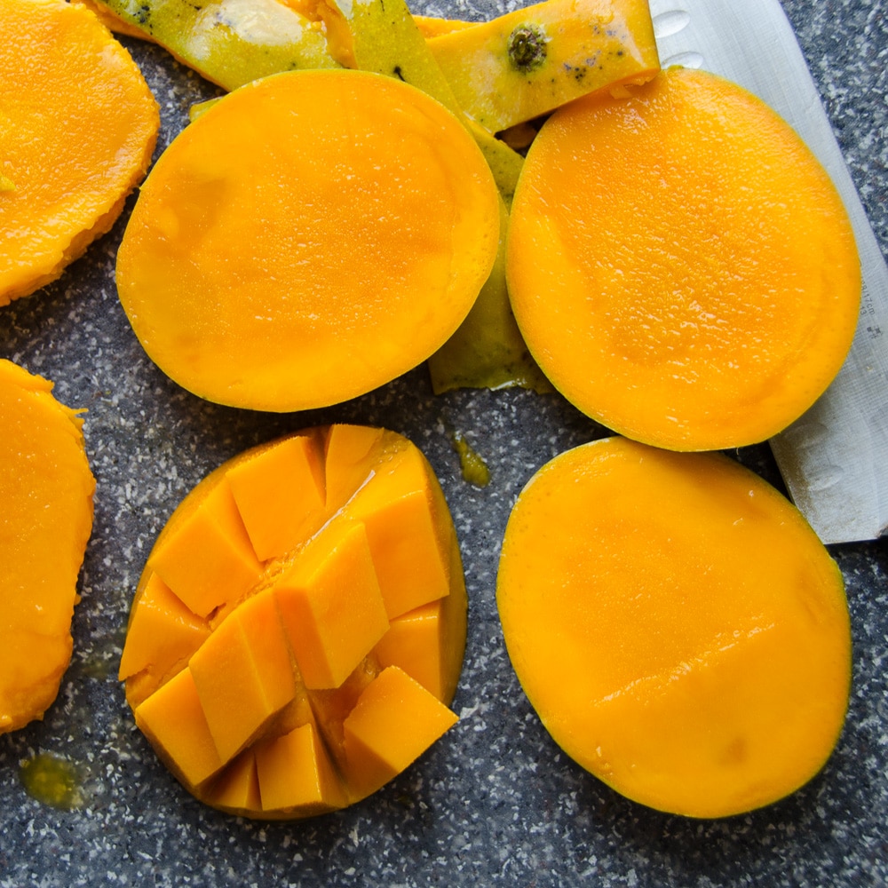 peeled and sliced mangoes