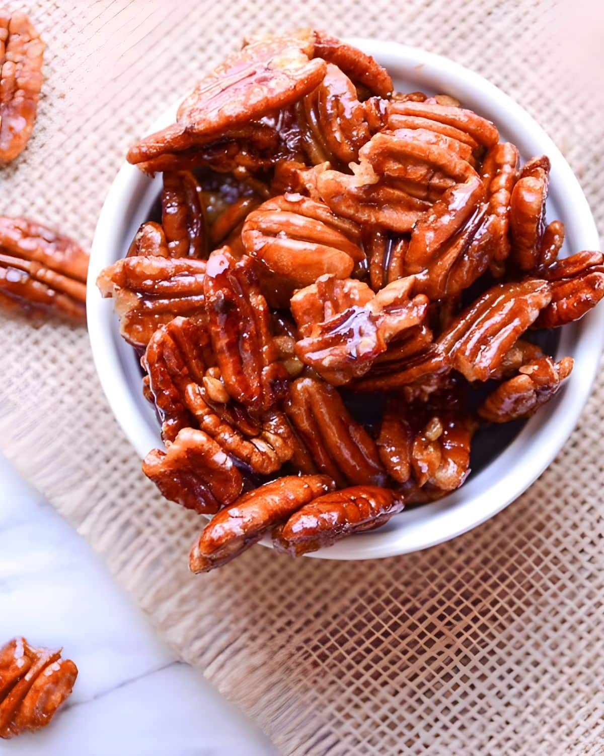 A dish of glazed spiced pecans.