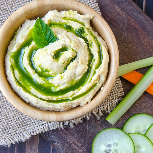Hummus with Basil-Cilantro Oil with cucumber, celery and carrot