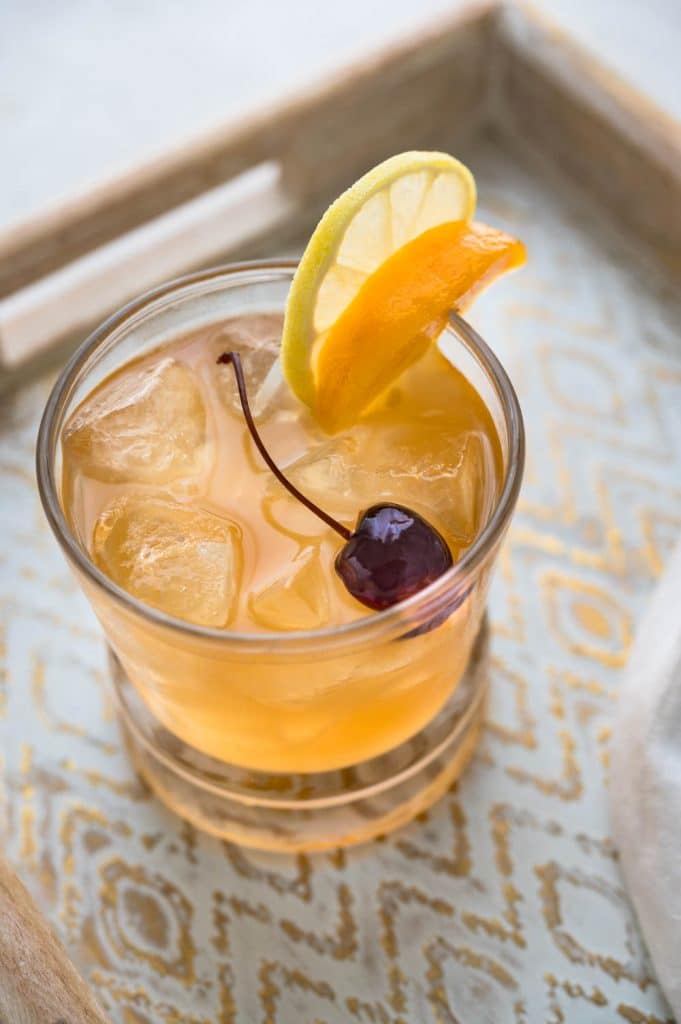 whiskey sour with fresh peach.