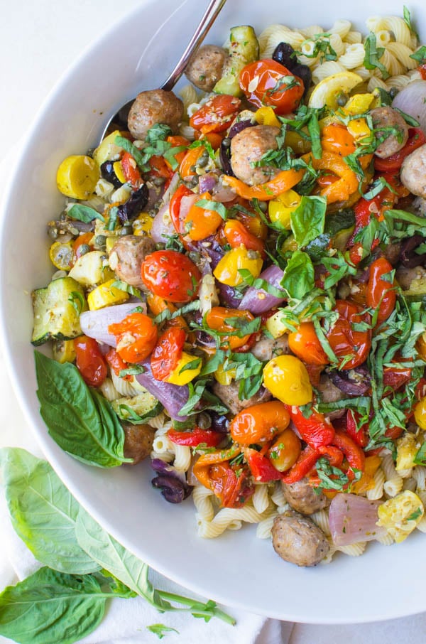 Mediterranean pasta in a bowl with fresh basil.