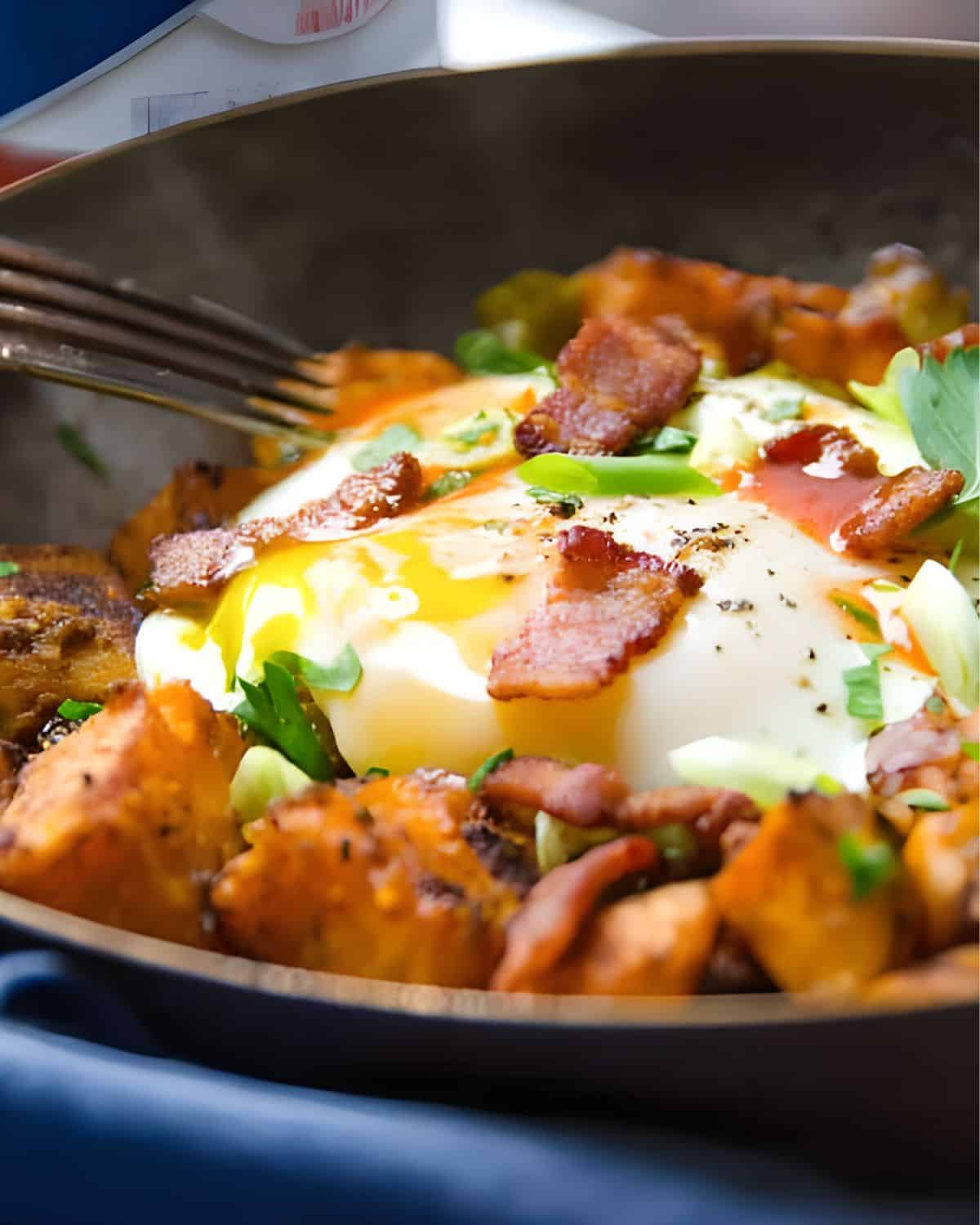 Sweet Potato and bacon hash with an egg on top.