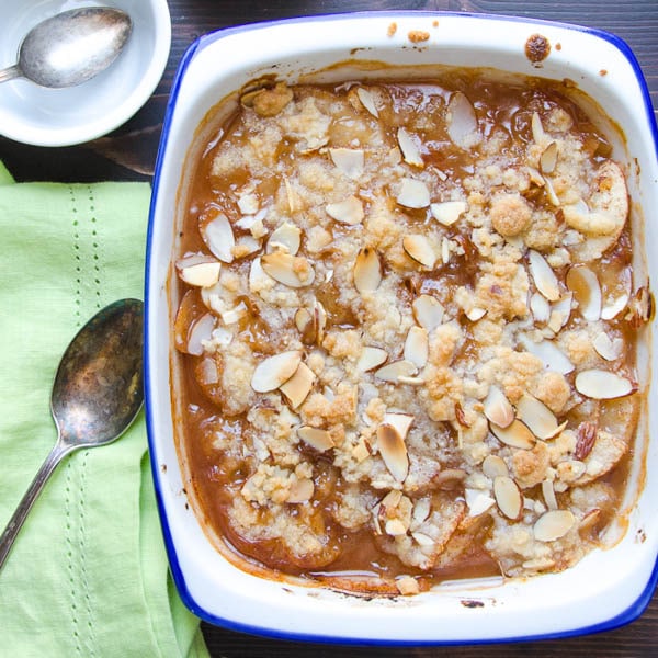 Ginger Pear and Almond Crumble with spoon and dish