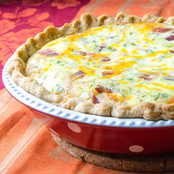 Loaded Baked Potato Quiche on tablecloth