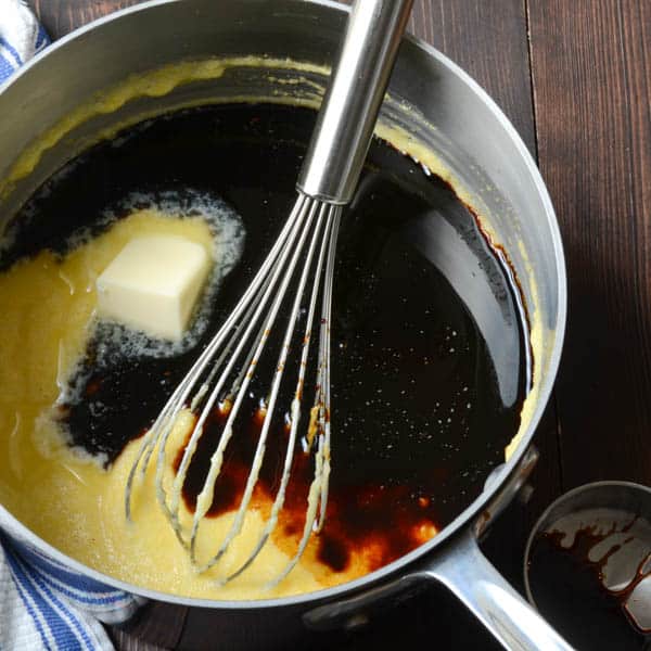 adding butter to molasses mixture