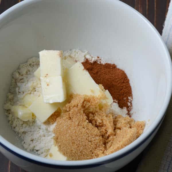 flour, butter, sugar, cinnamon in a bowl