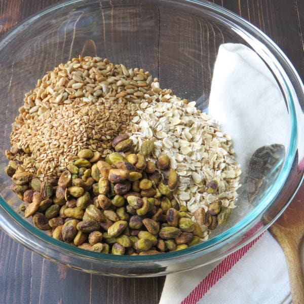 oats, pistachios, flax, sunflower seeds in a bowl