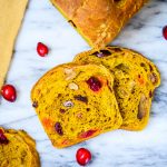 Sliced pumpkin cranberry bread.