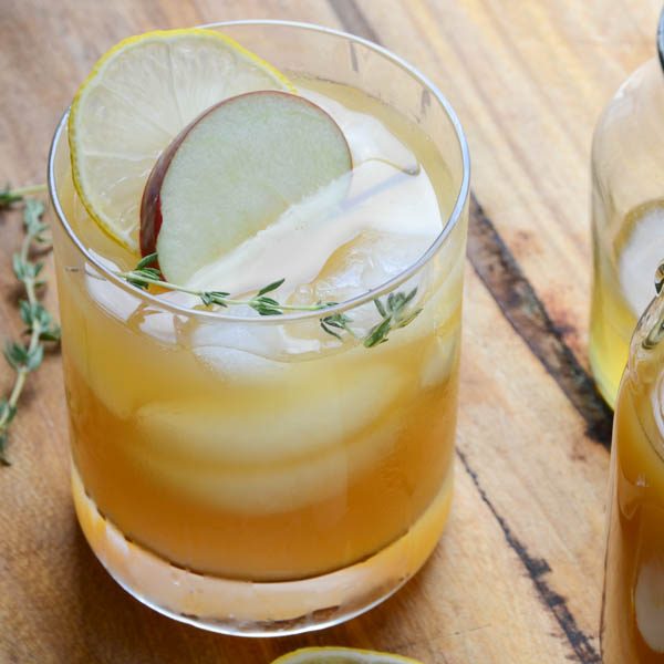 bourbon cider punch with apple thyme and lemon.