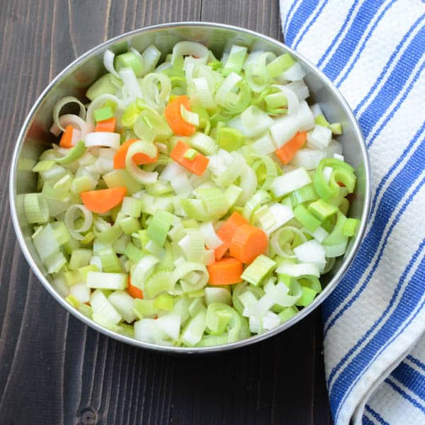 vegetables in a bowl with dish towel