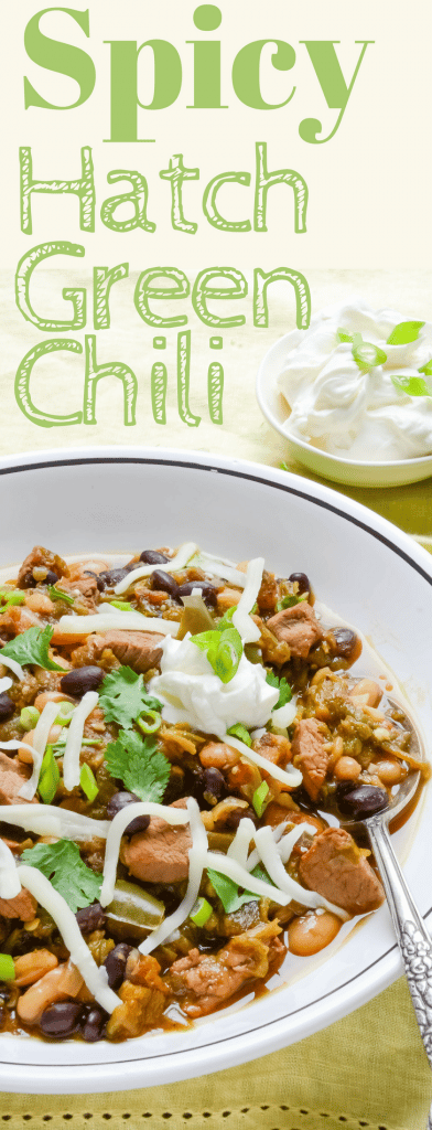 This easy recipe for Spicy Hatch Green Chili with lean pork tenderloin, tomatillos and two kinds of beans is the perfect healthy comfort food! #chili #chile #hatchchiles #greenchiles #blackbeans #pork #comfortfood #onepotmeals #winterfood #stew #soup #porkshoulder #slowcooker #instantpot #greenchili