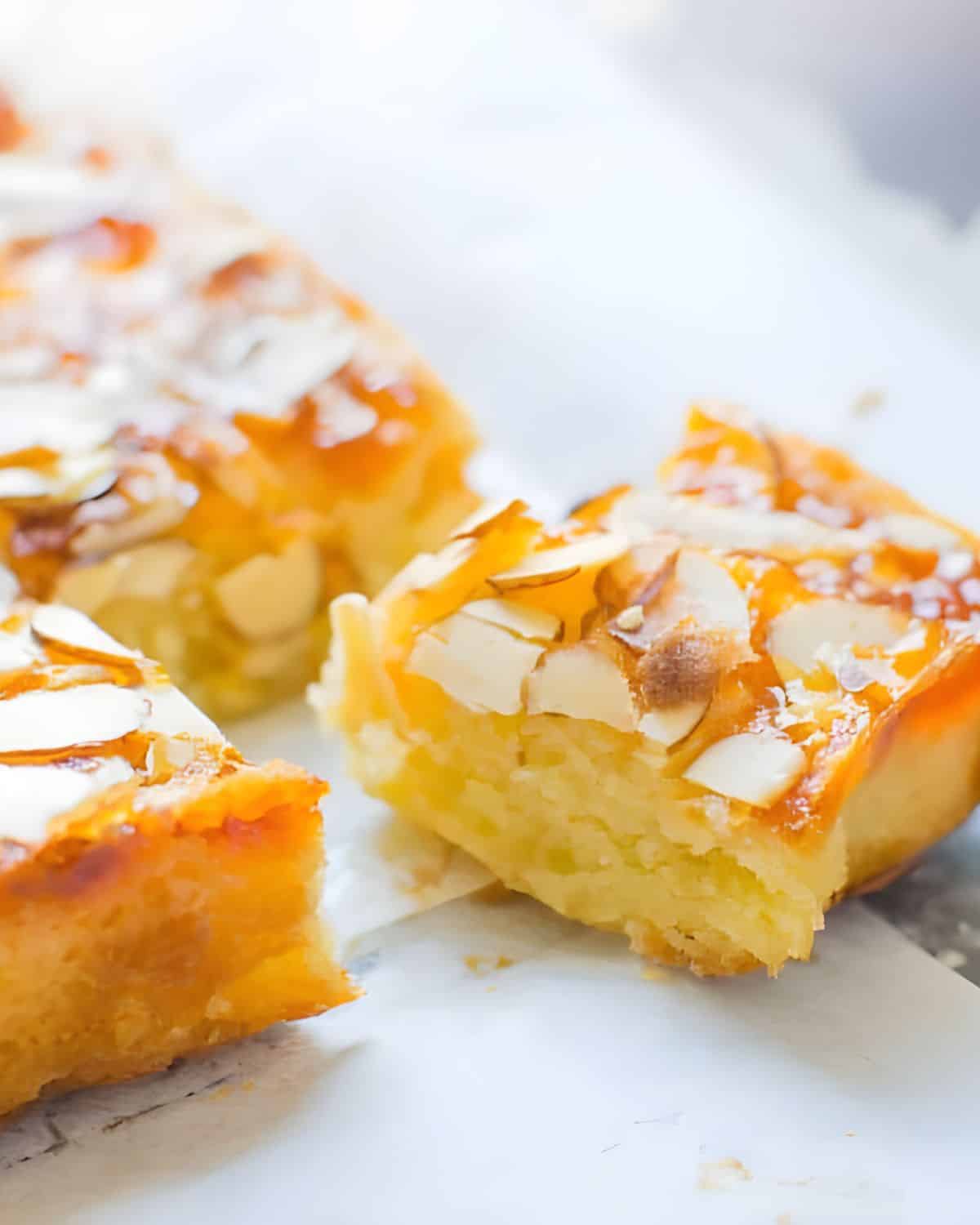 Slicing apricot almond bars into squares.