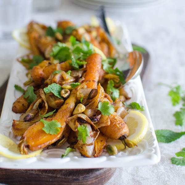Roasted Spiced Carrots with Pistachios on a platter