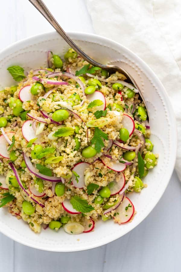 quinoa edamame side dish in a serving bowl. 