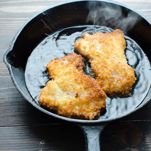 frying pork cutlets in a cast iron skillet