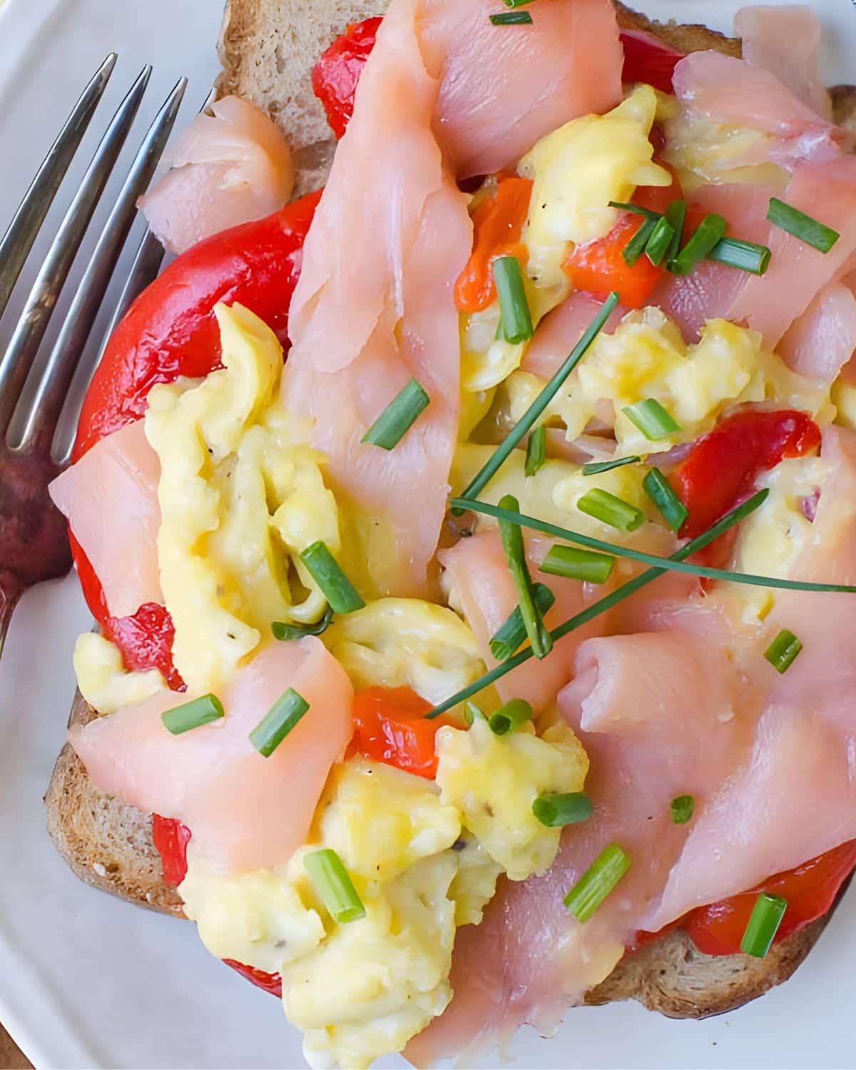 smoked salmon and scrambled eggs on toast.