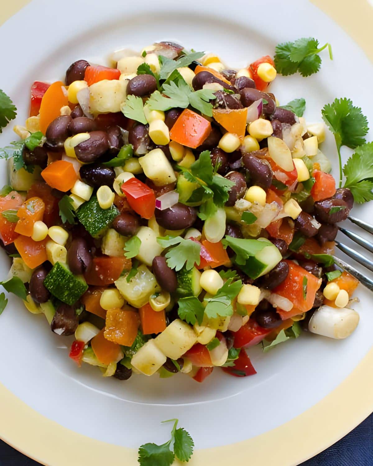 Serving Mexican chopped salad on a plate.
