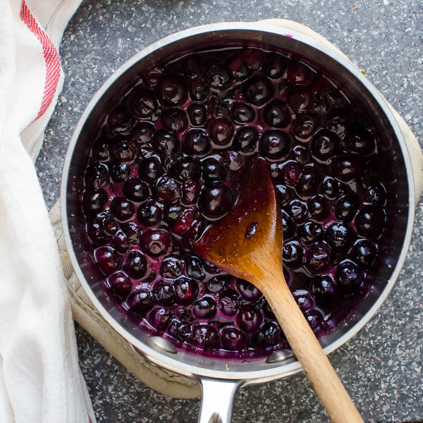 Cooking blueberry compote.