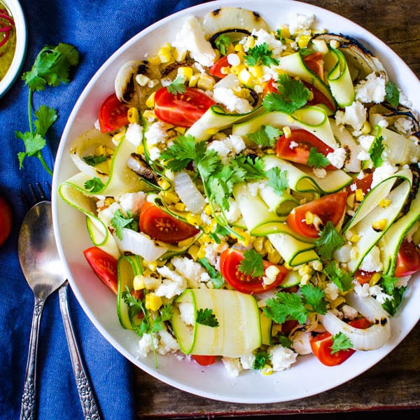 veggie salad with sprigs of cilantro