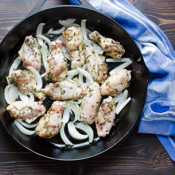 chicken wings in cast iron skillet