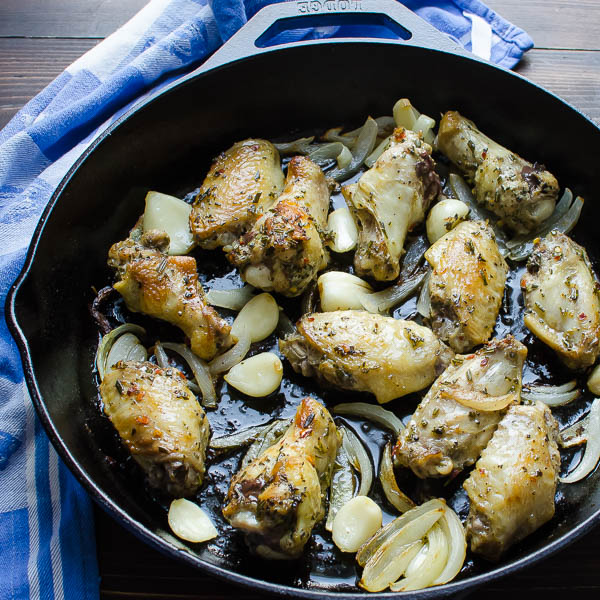 chicken wings seared in a pan