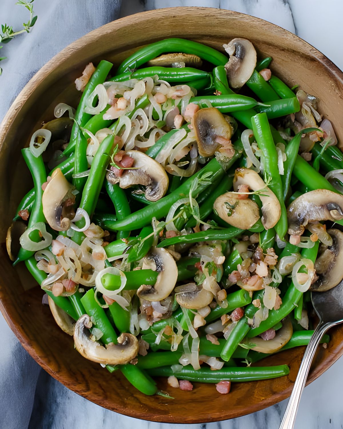 Holiday green beans with mushrooms and pancetta.