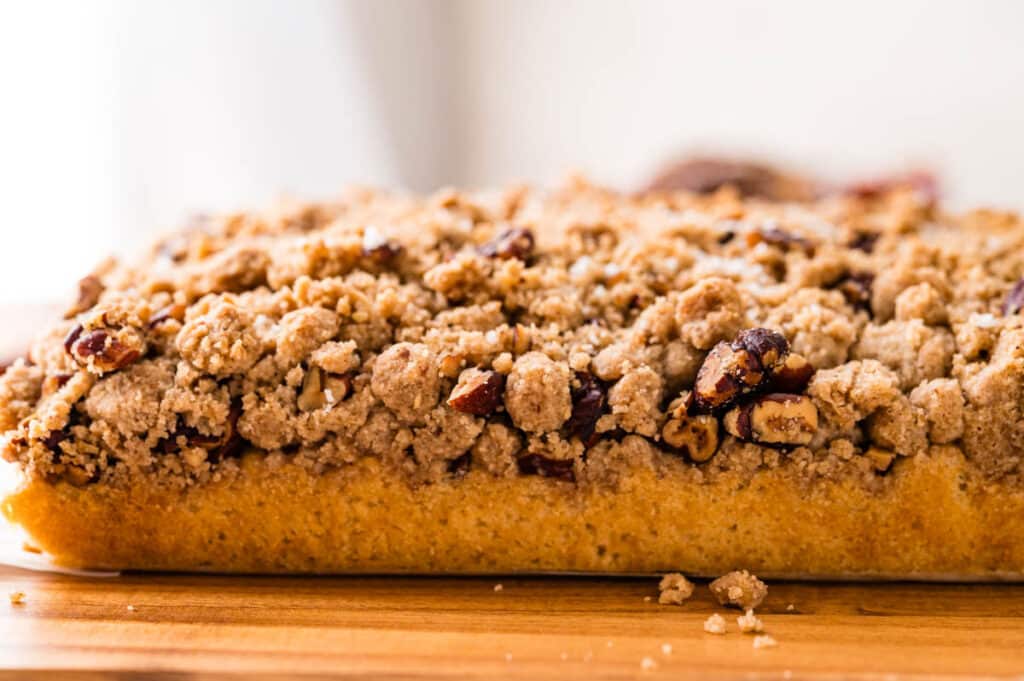 Cinnamon streusel coffee cake on a cutting board.