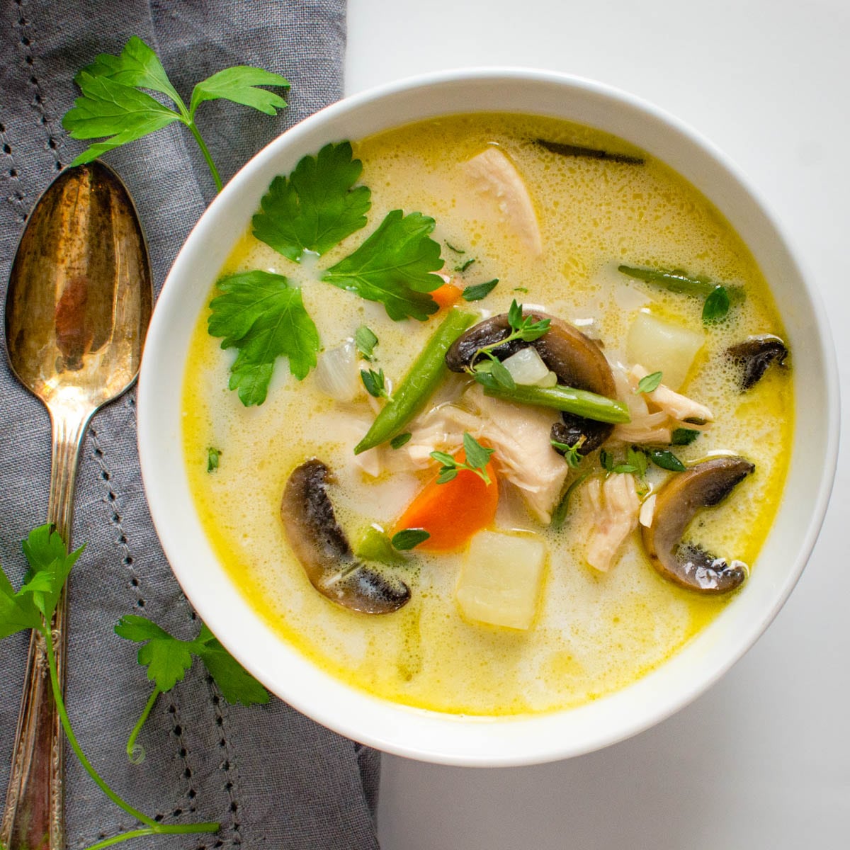 creamy turkey vegetable soup in a bowl.