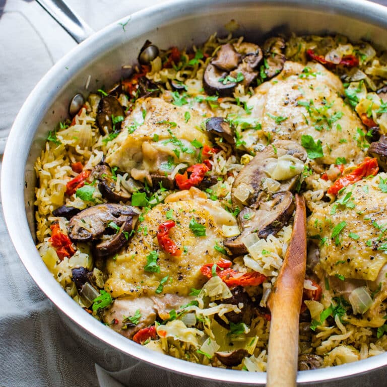 A skillet of chicken and rice.