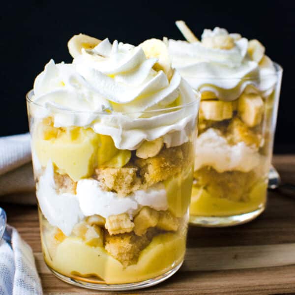 Banana pudding parfaits in a clear glass.