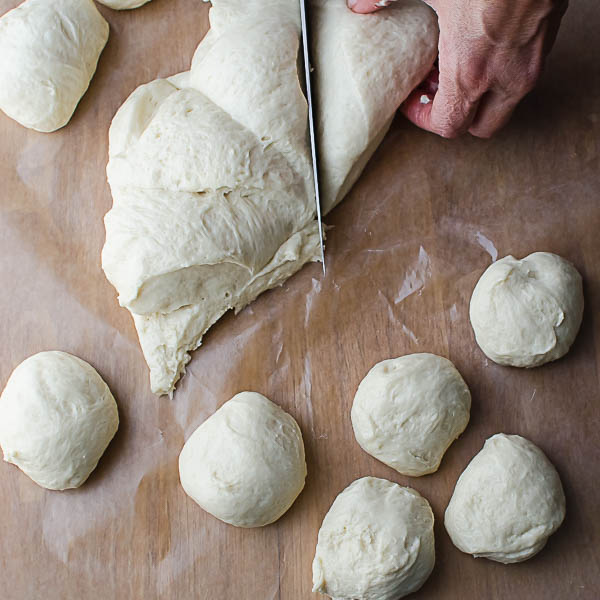 Cut the dough into pieces and roll into balls.