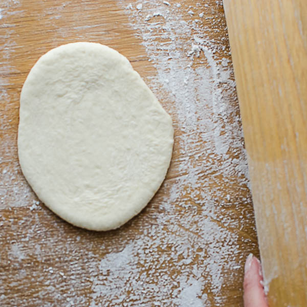 roll out the dough into buns.