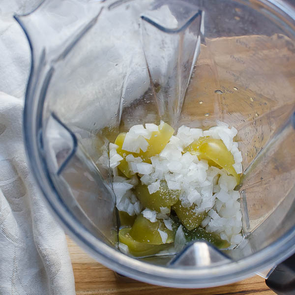 Blending Tomatillos and onions with salt