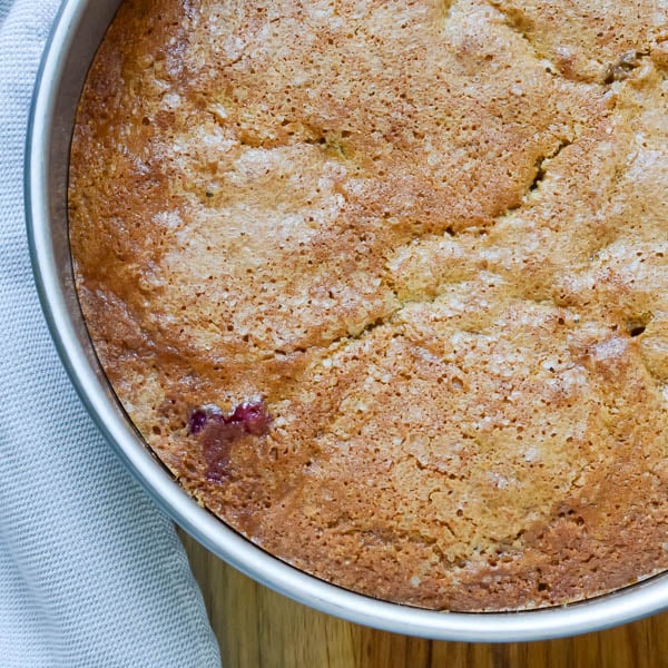Brown Sugar Cornmeal Plum Cake in cake pan.