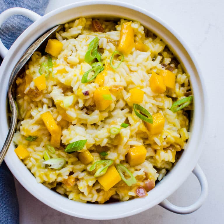 coconut mango rice side dish in a serving bowl.