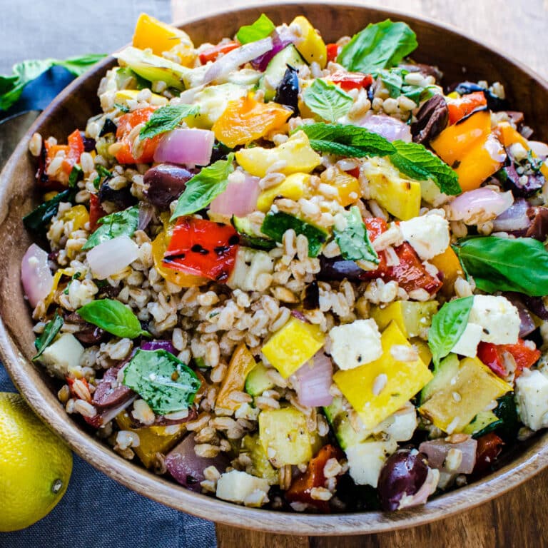 A bowl of grilled vegetable and farro salad.