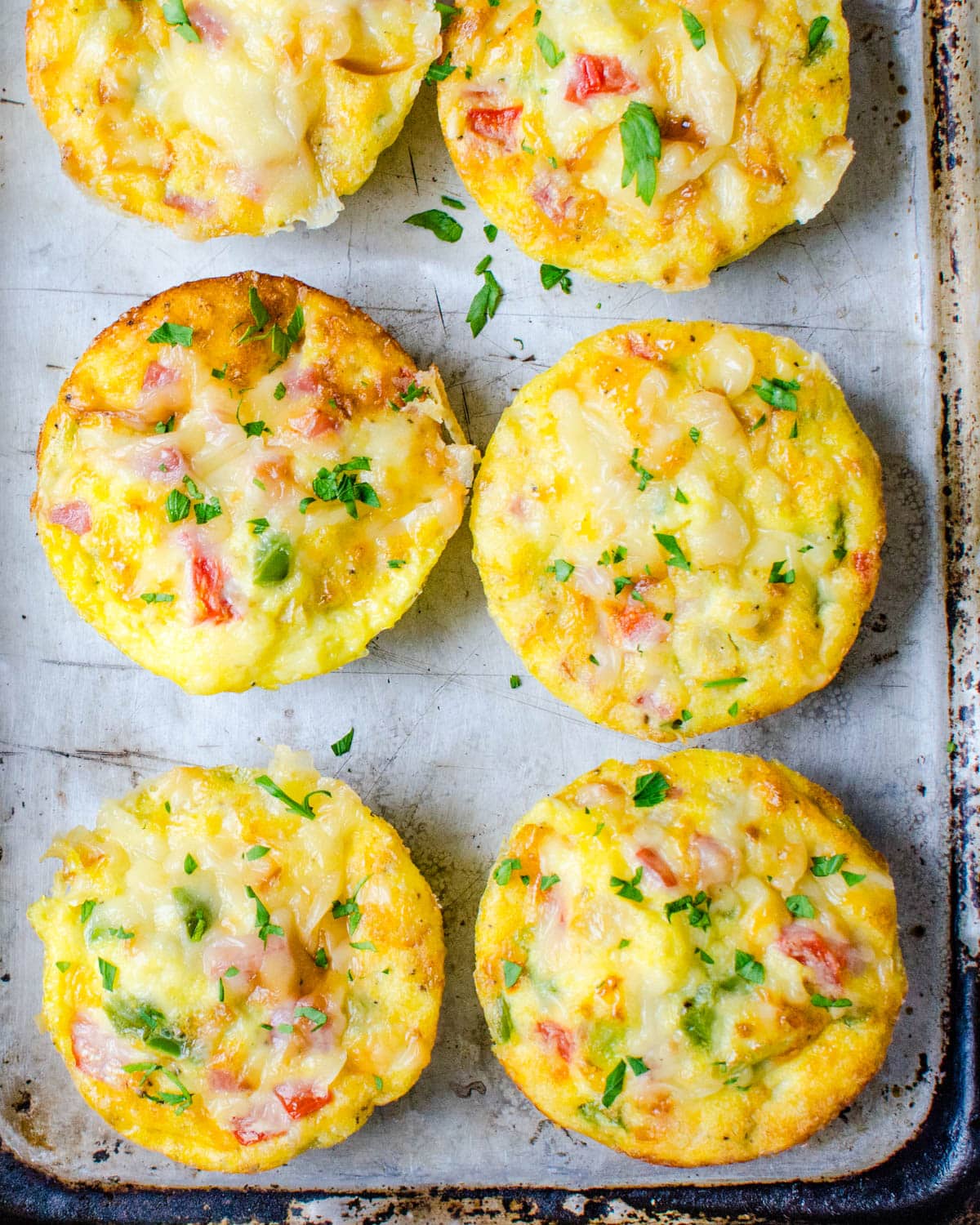 Egg omelette cups on a sheet pan.