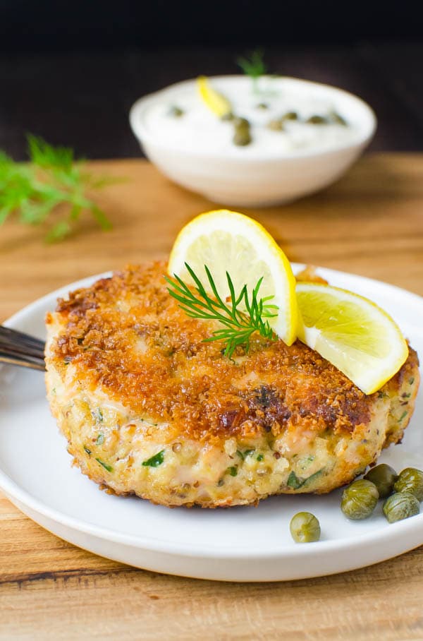 Serving salmon cakes with capers.